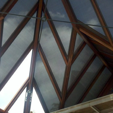 Main Line Conservatory (Fixed Solar Screens & Lutron Motorized Roller Shades)