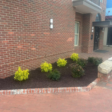 Custom Turf Landscape Area with Stone Border