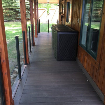 Wrap Around Composite Deck w/ Aluminum Frame-less Glass Railing in Seba Beach
