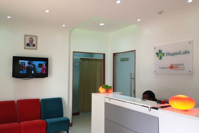 Example of a trendy home design design in Other