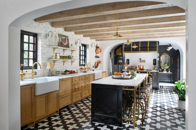 Example of a french country eat-in kitchen design in Denver with marble countertops and white countertops