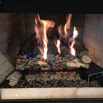 Vented gas logs