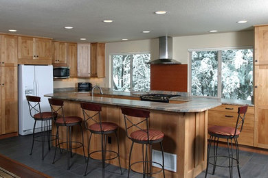 Open concept kitchen - mid-sized transitional galley slate floor open concept kitchen idea in Denver with an undermount sink, flat-panel cabinets, light wood cabinets, granite countertops, gray backsplash, stone slab backsplash and an island