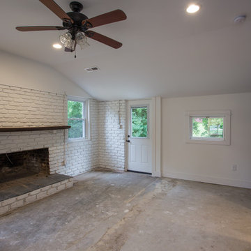 Family room with original poplar siding in Sherman Williams "Obsidian Glass", l