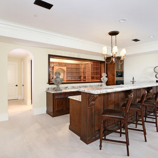 Design ideas for a large beach style walk-out basement in Orange County with yellow walls and travertine flooring.