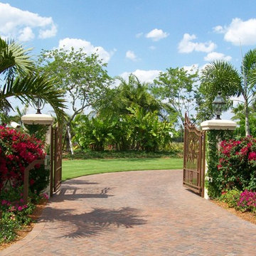 A lushly landscaped private entrance welcomes family and visitors alike