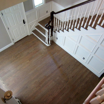 NISSEQUOGUE:  2 1/4" RED OAK W/ CUSTOM GREY BLEND STAIN + BONA TRAFFIC HD SATIN