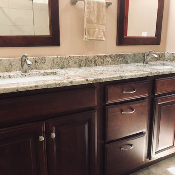 Typhoon Bordeaux Granite with Wellborn Cabinets