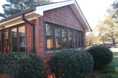 Inspiration for a mid-sized timeless sunroom remodel in Other