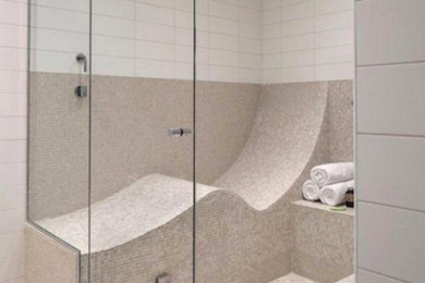 Mid-sized master gray tile and mosaic tile pebble tile floor walk-in shower photo in Calgary with white walls