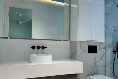 Example of a mid-sized trendy 3/4 white tile and porcelain tile porcelain tile, white floor and single-sink bathroom design in Tampa with flat-panel cabinets, white cabinets, a wall-mount toilet, white walls, a vessel sink, quartz countertops, white countertops, a niche and a floating vanity