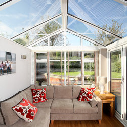 White Conservatory with PVCu Bi-Fold Doors - Products