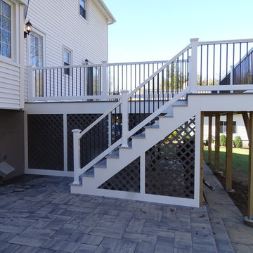 Raised Deck with attached Patio with fireplace