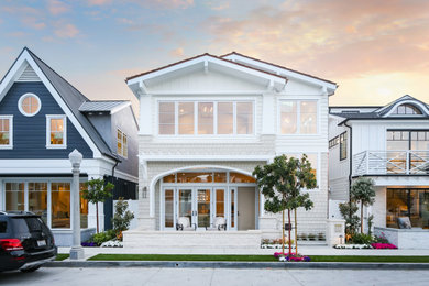 Inspiration for a coastal exterior home remodel in Orange County