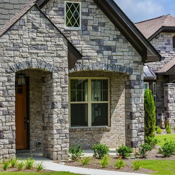 Traditional Exteriors Featuring Stone
