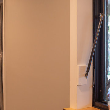 Basement Utilizing Open Space to Shoot Pool and Watch Favorite Sports Team