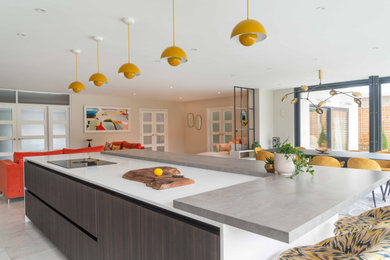 Contemporary open plan kitchen in West Midlands with an island.