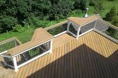 Inspiration for a large timeless backyard deck remodel in Baltimore with no cover