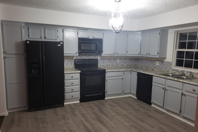 Example of a transitional kitchen design in Other