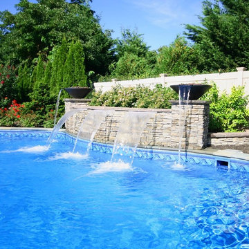 Custom swimming pool with water feature