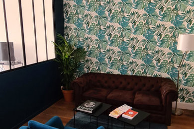 Idée de décoration pour un salon design de taille moyenne.