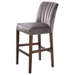 Harp and Finial - Capp Bar Stool Dove Gray Velvet Hardwood Frame - The Capp Bar Stool presents a simple design while promoting elegant materials and clean lines. The gray velvet fabric has sleek vertical ridges along the backrest, emphasizing the piece's linear design. The hardwood frame showcases tall legs and a convenient footrest, giving the stool a natural elegance that perfectly accents a dining room or kitchen.