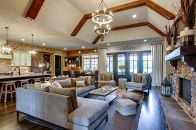 Inspiration for a transitional living room remodel in Nashville with a standard fireplace and a stone fireplace