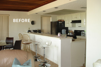 Kitchen - small contemporary single-wall porcelain tile and gray floor kitchen idea in Austin with an undermount sink, flat-panel cabinets, light wood cabinets, concrete countertops, black backsplash, stone slab backsplash, black appliances, an island and blue countertops