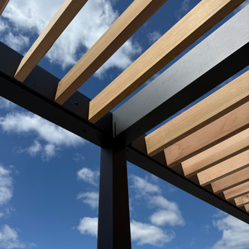 A Close Up of a Wood and Powder Coated Aluminum Pergola