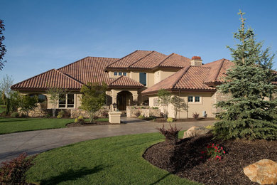 Tuscan home design photo in Boise