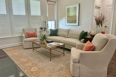 Inspiration for a formal and open concept dark wood floor and brown floor living room remodel in New Orleans with white walls