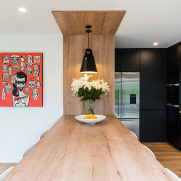 Stunning Black and Wood-Look entertainers kitchen