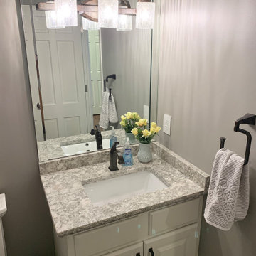 Open Concept Remodel in Rock Island With Walls Removed and a Custom Entry Bench