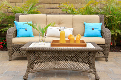 Mid-sized island style backyard patio photo in Orange County