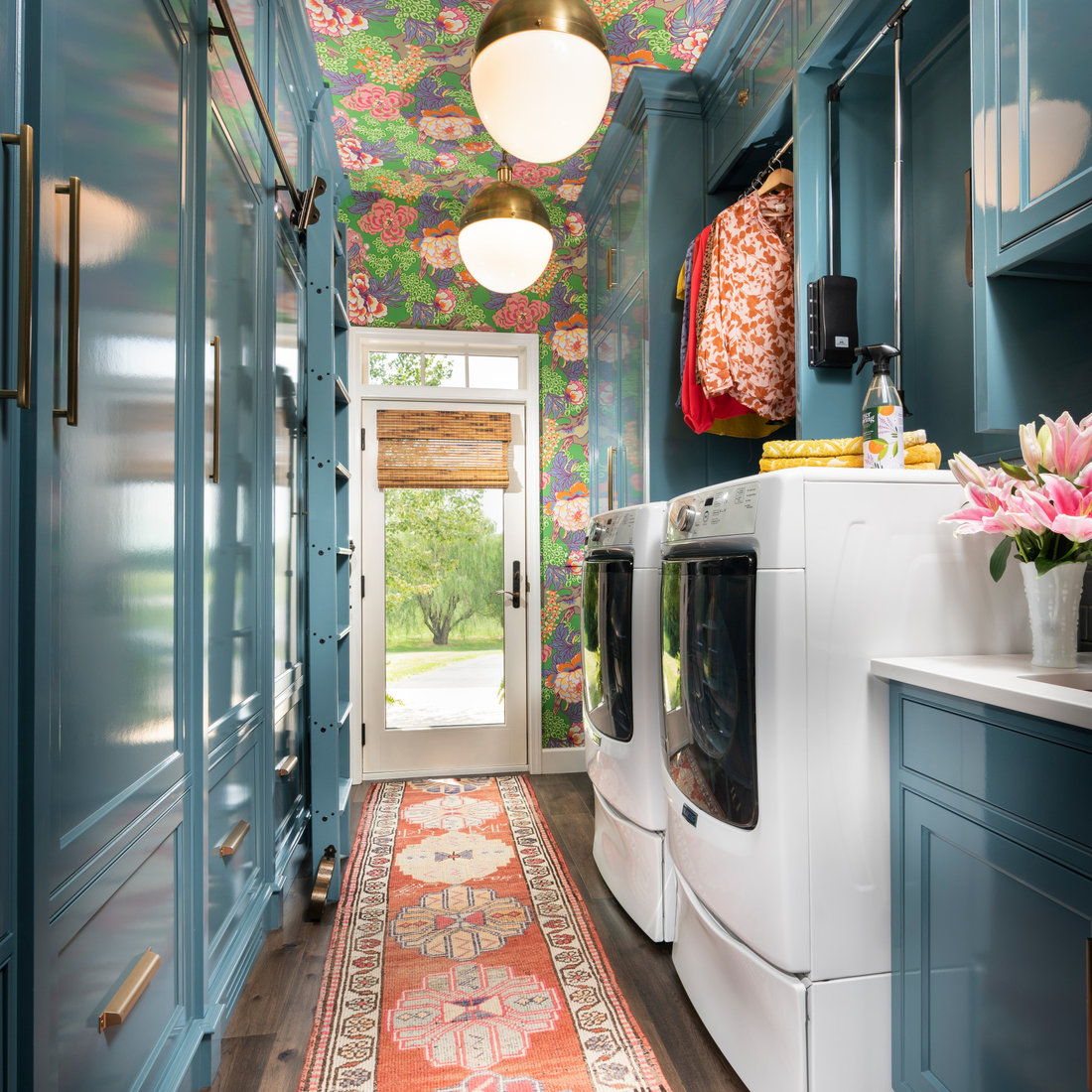 Blue Galley Style Laundry Room