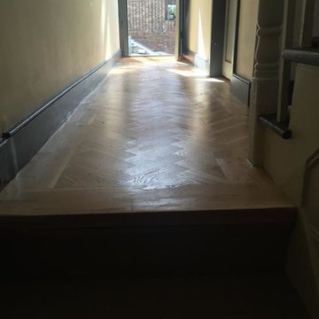 Installing Herringbone Wood Floor to Premises