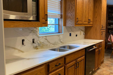 Example of a transitional kitchen design in Houston