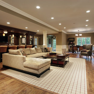 Inspiration for a large classic walk-out basement in Minneapolis with brown walls, vinyl flooring, no fireplace and brown floors.