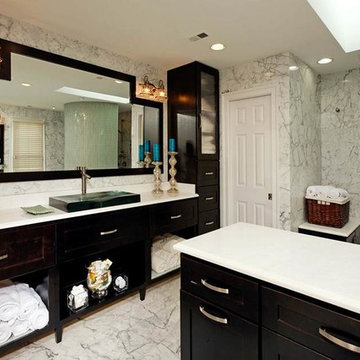 Elegant Bath Remodel Uses Marble and Glass by Michael Nash Design, Build & Homes