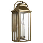 Visual Comfort Studio Collection - Wellsworth Small Lantern, Painted Distressed Brass - The Feiss Wellsworth three light outdoor wall fixture in painted distressed brass enhances the beauty of your property, makes your home safer and more secure, and increases the number of pleasurable hours you spend outdoors. A subtle interplay of traditional design elements and nautical influences creates the charming visual approach to the Wellsworth outdoor collection by Feiss. Available in three finishes and two different aesthetics. Antique Bronze finish paired with Clear Seeded glass creates a more traditional look to these outdoor light fixtures; while Burnished Brass and Painted Brushed Steel finish coupled with Clear glass reflects a more contemporary approach. The Wellsworth collection includes a 3-light outdoor pendant, a 3-light outdoor post lantern, and 3-light small and medium outdoor lanterns, as well as a 4-light large outdoor lantern. Cast aluminum construction ensures durability. Wet Rated.