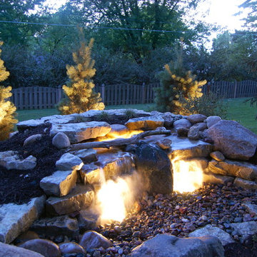 Omaha paver patio/pondless waterfall