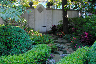 Photo of a small traditional shade side yard stone landscaping in Nashville for spring.