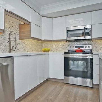 Condo kitchen counter top. Pure White Quartz.