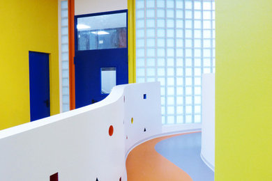 Kids' room - modern linoleum floor and multicolored floor kids' room idea in Milan with multicolored walls