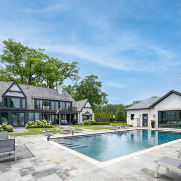 Lakefront Pool Anchors the Home and Steel Effect Pool House in Lake Bluff