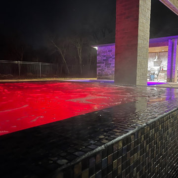 Polymer vinyl liner pool w/concrete spillover spa & automatic pool cover