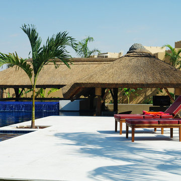 Thatch & timber is the is the focal point of this beautifully landscaped garden