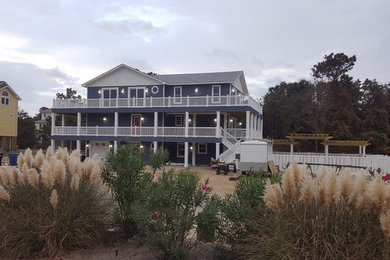 Coastal exterior home idea in Other