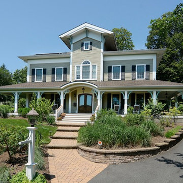 New home with wrap around porch.