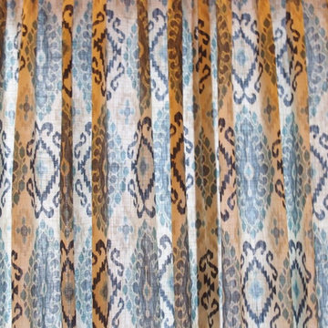 Draperies on a Twelve Foot Door and Window in a large Family Room